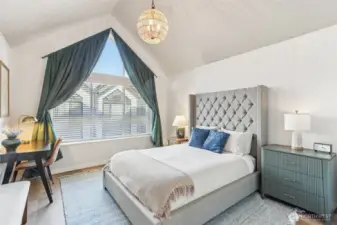 Drama in your stunning Primary Suite has vaulted ceilings and tall windows for all the natural light