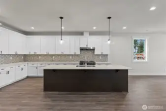 Light and bright kitchen with island large enough for 4+ seats