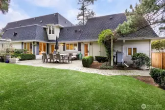 Back yard with a brick patio