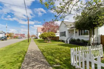 Front yard with sidewalk, walk to town