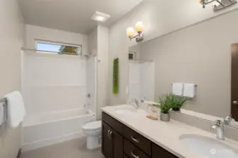 Upstairs full bath with double vanity sinks