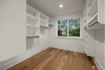 Primary bedroom walk-in closet