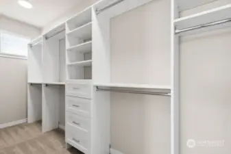 Love this closet system in the primary bedroom walk in closet!