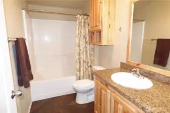 Full bathroom located by bedrooms 1 and 2.