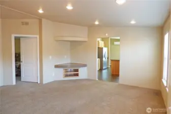 The other side of the living room with great spot for tv.