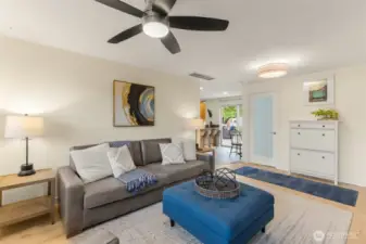 Garage access to right (off camera) and frosted door is bonus space/den with window perfect for office.