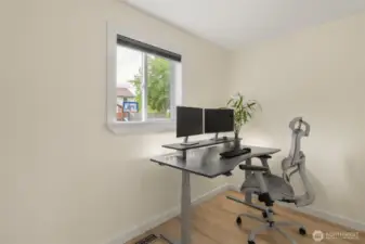 Bonus space/den with window off family room.