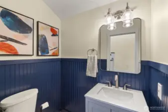 1/2 bath at base of stairs