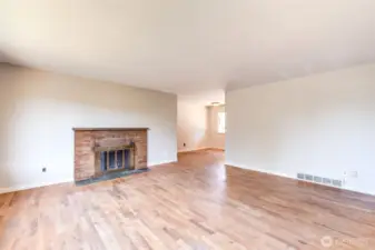 Main level has a large living room & original hardwoods.