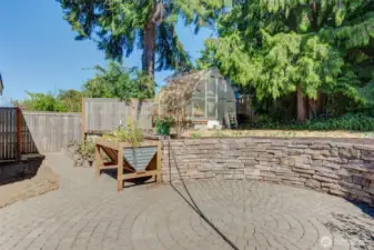 Garden areas & a greenhouse