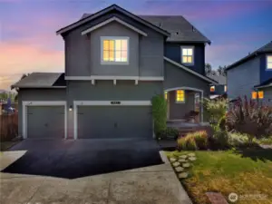 This stunning home truly shines—day or night. With charming curb appeal and warm twilight glow, it welcomes you in with style and comfort. Plus, enjoy a spacious 3-car garage and beautifully landscaped entry!