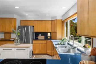The rolling kitchen island can be relocated for more space if needed.