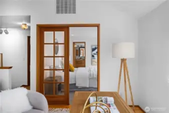 French doors lead to the primary suite.