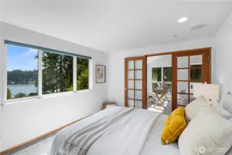 Perfectly sized primary suite - enjoy the gorgeous sunrise and treehouse vibes!