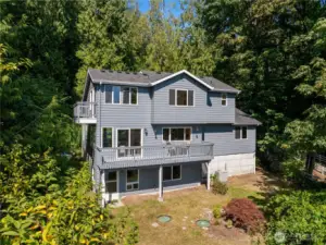 Looking back toward the house and backyard garden-level and ready for your creativity. To the left is the additional tax lot - privacy in perpetuity!