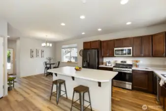 Cook, gather, and connect in this spacious kitchen with island seating.