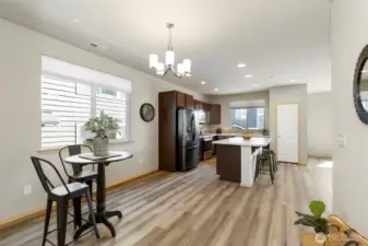 Open kitchen and dining, great for gathering.