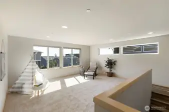 Loft space for play, work, or quiet time.