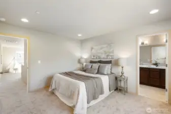 Peaceful primary bedroom with ensuite.