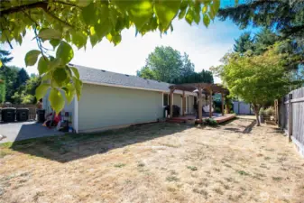 Good Sized private backyard. RV parking on the left with power as well!