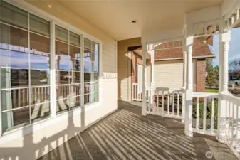 Covered Front porch facing South for lots of sun.