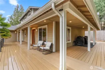 New lifetime deck surface with custom-made railings, providing a durable and inviting outdoor space to relax and take in the scenic surroundings.