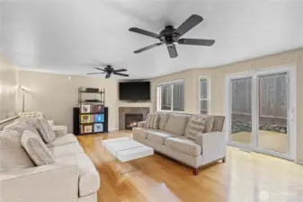 Main floor living room with open concept to the kitchen