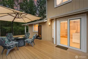 Continuation of deck with plenty of space for outdoor entertainment and enjoyment