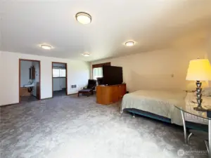 3/4 bath and walk-in closet in the background