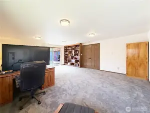 This room can be used however you want. Currently used as the primary bedroom and office.