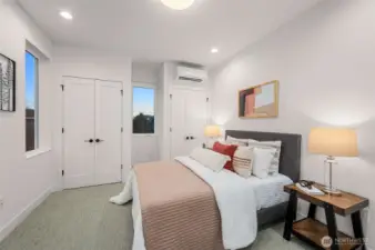 Step into a peaceful retreat where modern design meets cozy comfort. This sunlit bedroom is your sanctuary, complete with ample closet space and serene views.