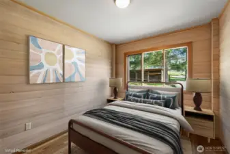 Bright, serene, and effortlessly stylish—this virtually remodeled bedroom pairs soft wood tones with modern textures for a perfectly cozy retreat. Proof that simple updates can totally transform a space.