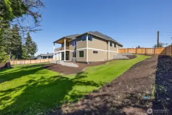 With over 1/2 acres of property, there is more than enough room for play, pets, privacy, gardening, and even space for a detached garage/shop.