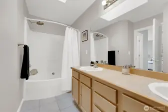 Primary bathroom with big soaking tub/shower & dual sink vanity