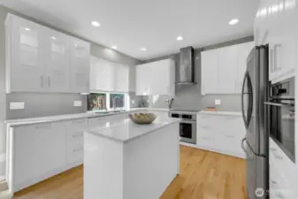 Stunning! And functional  Lighting in glass fronted cabinet along with under cabinet lighting