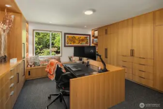 The second bedroom on this floor currently serves as a sumptuous closet/dressing room/office.  The center desk is removable, and there is room for a bed to the right.