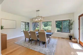 French doors open to the deck and backyard for indoor-outdoor flow