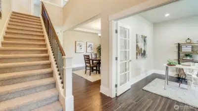 Enter to warmth and elegance throughout this home with beautiful engineered hardwood floors adding to the homes seamless layout.