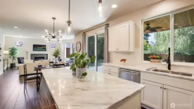 Thoughtfully designed layout with open-concept floor plan and direct access to the serene backyard.