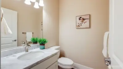 Convenient half bath on the main floor.