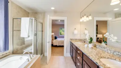 Relax after a long day with a hot bath or in the large walk-in shower.