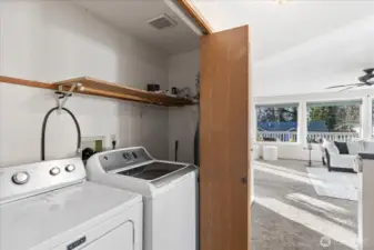 Main floor laundry. Washer/dryer stay.