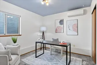 Downstairs bedroom #2, with new carpet & mini-split.  Staged as an office.