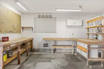 Oversized garage with workshop area.