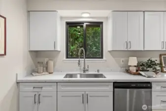 Gaze out to your gorgeous backyard while doing the dishes in your brand new farm-style commodious sink.