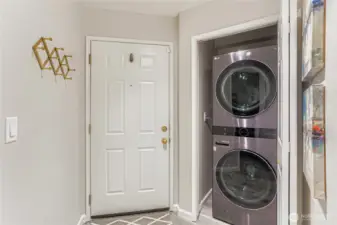 Convenient laundry in the entry to leave all your worries behind