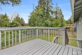 From the dining room, walk out to the large deck.