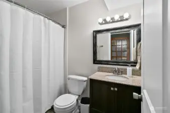 The lower Primay Bath has a deep soaking tub behind that curtain:)