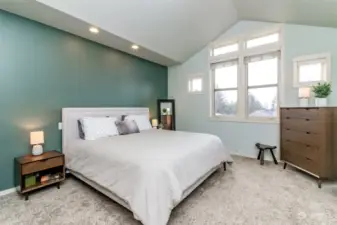 Vaulted Primary bedroom with Oversized windows to enjoy the view