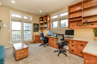 Now here's a real home office for two.  Custom base built-ins with cabinets above.